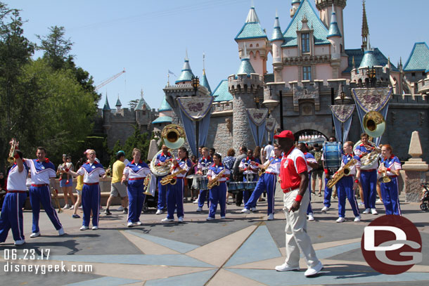 The 2017 All-American College Band performing in front of Sleeping Beauty Castle