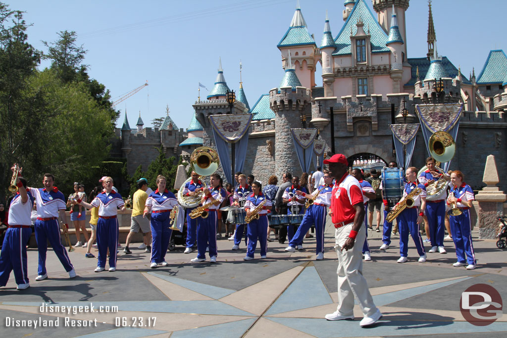 The 2017 All-American College Band performing in front of Sleeping Beauty Castle