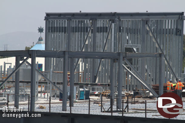 Up on the roof work continues on the roof itself as well as the support structures on it.