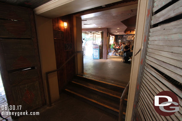 Stairs leading up to a second seating area closer to the BBQ.