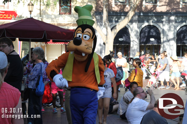 Goofy passing through Town Square.