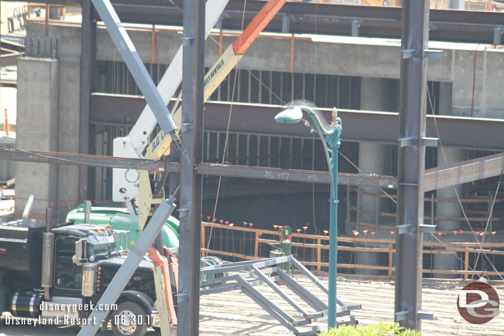 Wall structures in the curved area and more steel waiting to be moved into place in the large open area now.