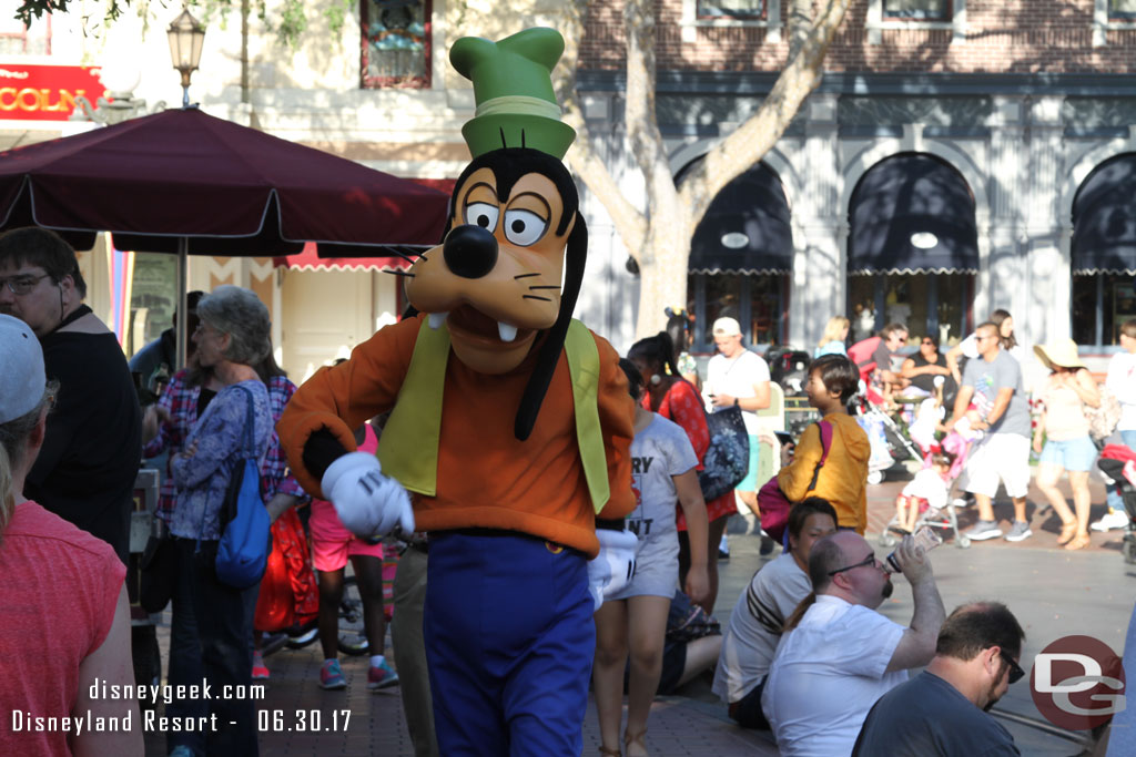 Goofy passing through Town Square.