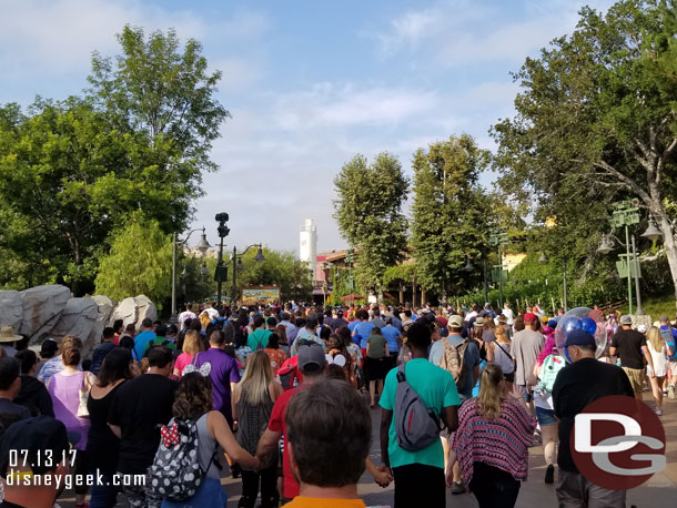 The crowd heading into the park, almost every one of these guests turned for Racers FastPasses or into Cars Land.