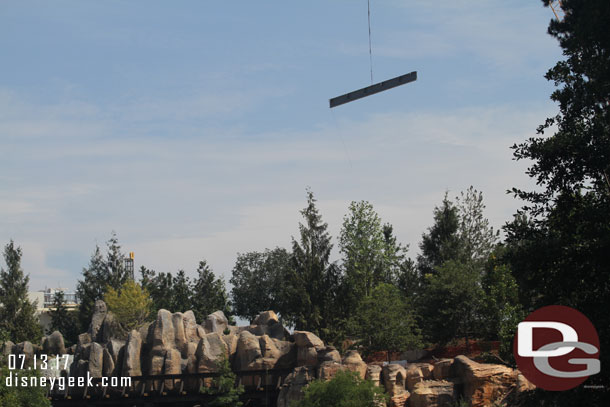 A beam being moved into place in Star Was Land.