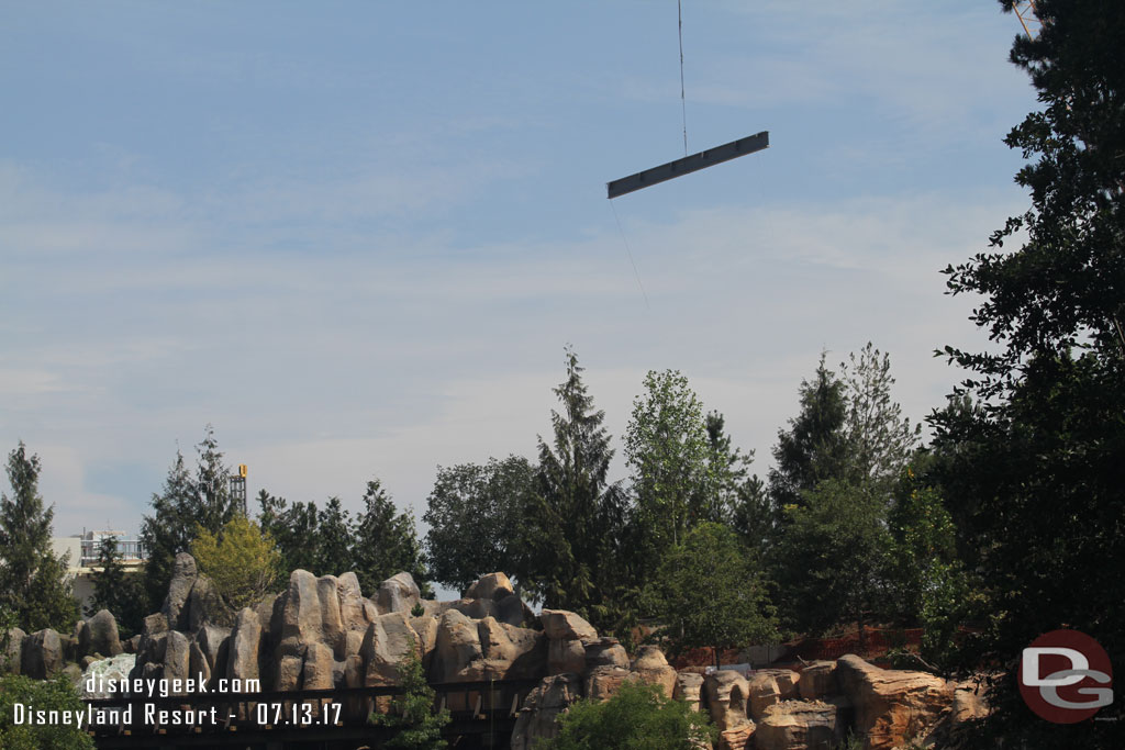 A beam being moved into place in Star Was Land.