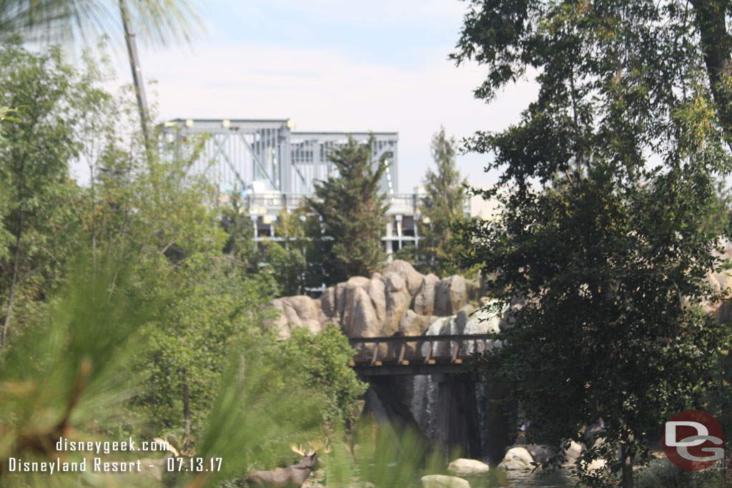 The buildings are visible over the trees right now.