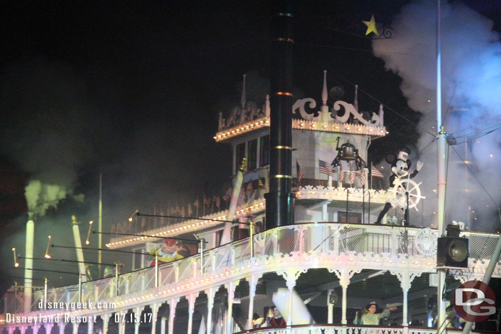 The Mark Twain making its pass, piloted by Mickey Mouse.