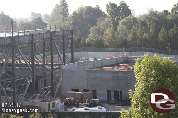 Work continues on the roof of the structure next to the building.  Looks like forms and connection points for steel that will support the facade are being installed.