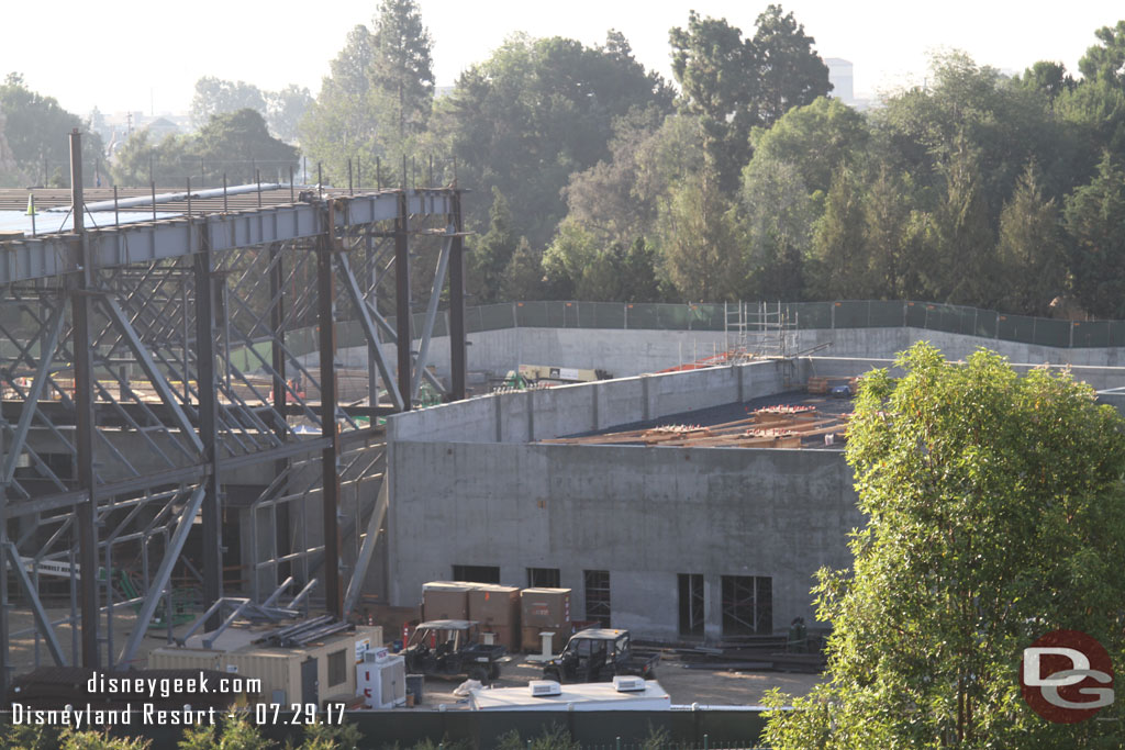 Work continues on the roof of the structure next to the building.  Looks like forms and connection points for steel that will support the facade are being installed.