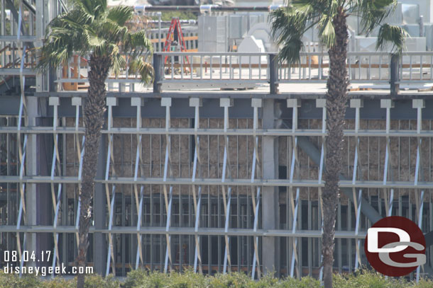 Looks like insulation going in between the exterior and interior walls of the Battle Escape building.