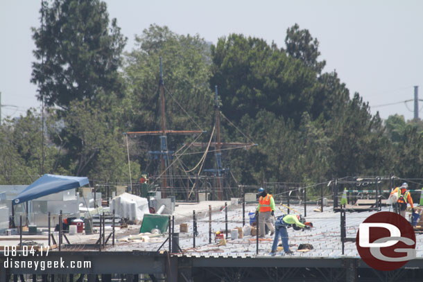 The last third of the roof has the steel deck laid and they are preparing it for concrete.