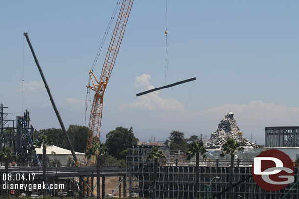 Large steel beems still being moved into place.