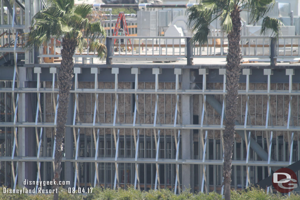 Looks like insulation going in between the exterior and interior walls of the Battle Escape building.