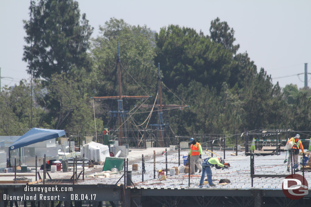 The last third of the roof has the steel deck laid and they are preparing it for concrete.