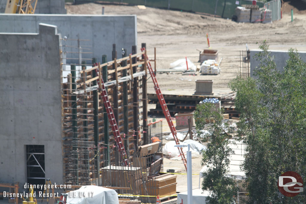 Looks like they are starting to put in rebar to join the wall on the concrete building to the perimeter wall.