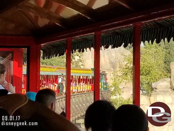 Looking across my car as the train rounded the bend to the right along the Rivers of America.