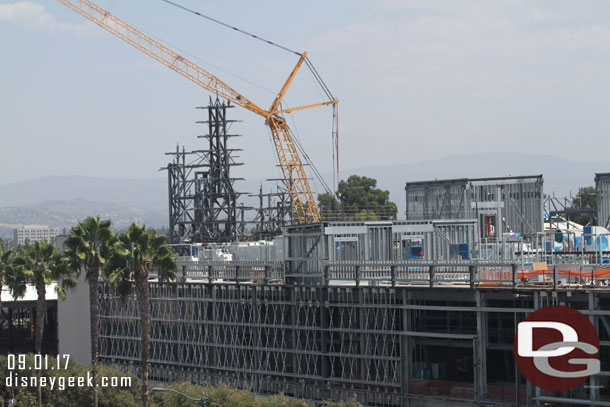 In the distance steel rising above the Millennium Falcon building that will form more mountains and rock work.