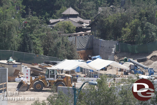 The tents appear to be a break/lunch area for the construction teams.  Beyond them is the entrance to Critter Country.