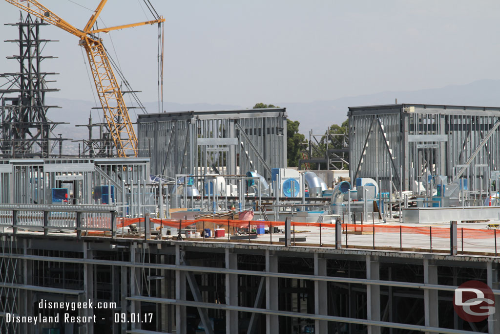 A lot of HVAC and other equipment being installed on the roof.