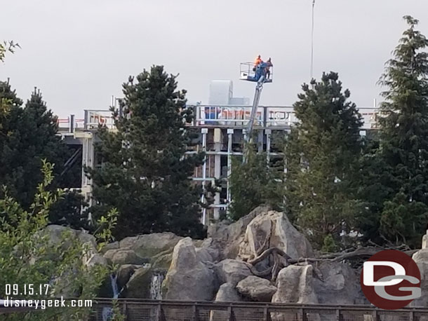 These two workers appeared to be taking in the view as we passed by.  