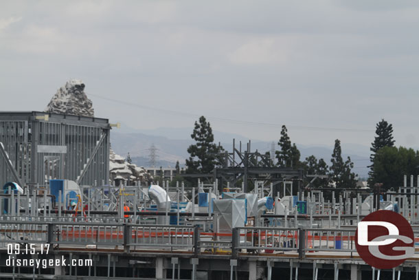 More steel for rock work is visible on the far side of the Battle Escape building.