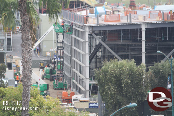 Preparations for the exterior wall of the Millennium Falcon show building along the backstage road.