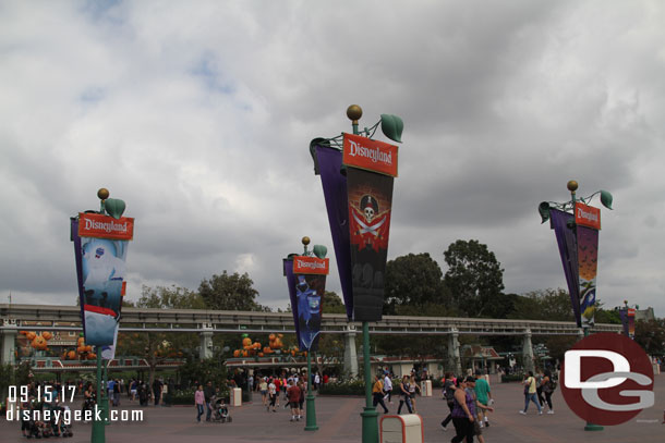 The banners in the Esplanade have been replaced with Halloween Time ones.  Also they now feature the park you are looking towards.