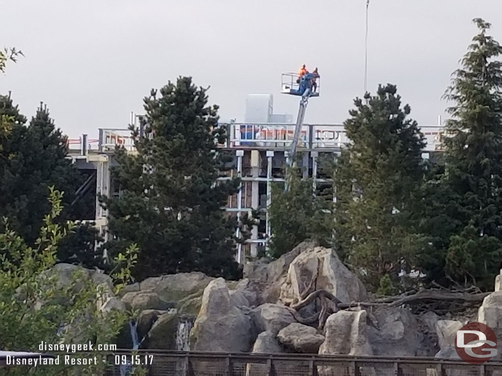 These two workers appeared to be taking in the view as we passed by.  