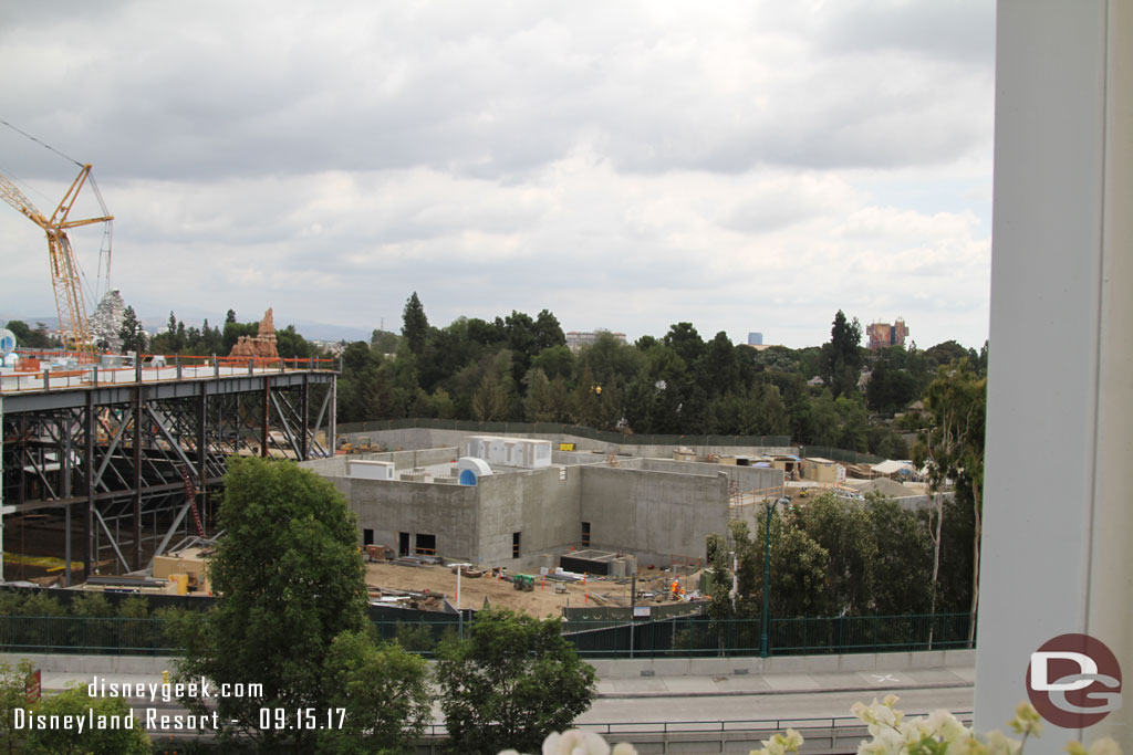 The concrete building to the right has no real visible progress since last visit.