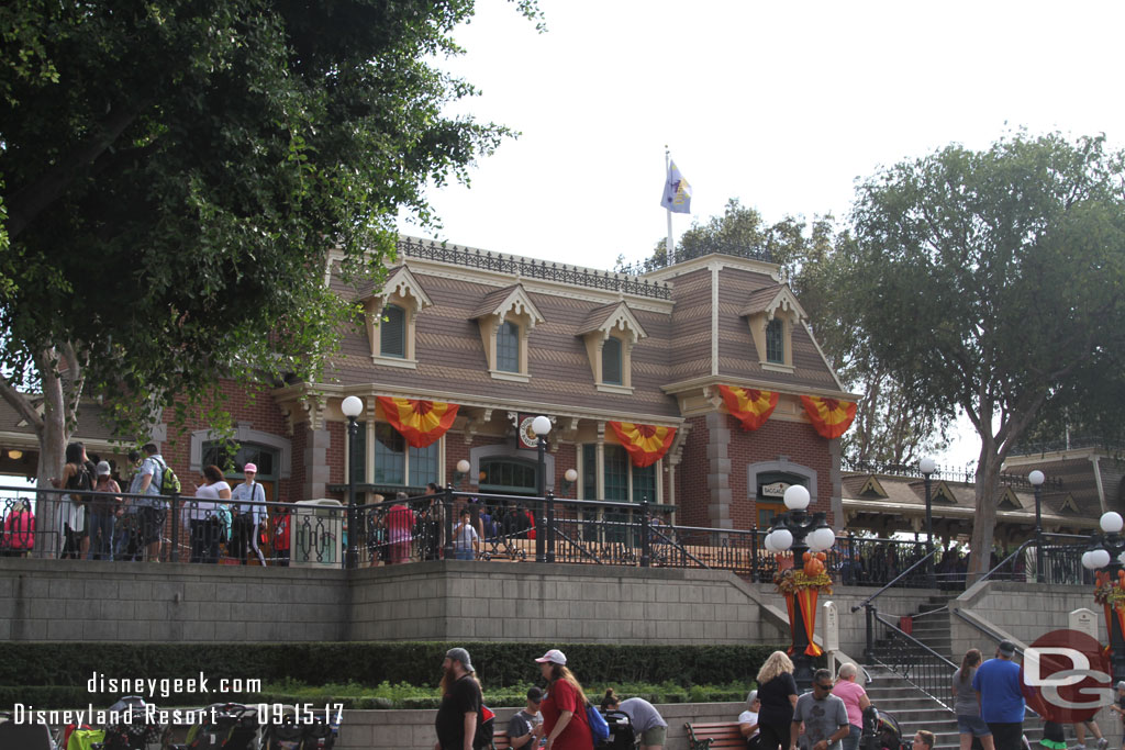 The Disneyland Railroad queue stretched back toward the steps still.