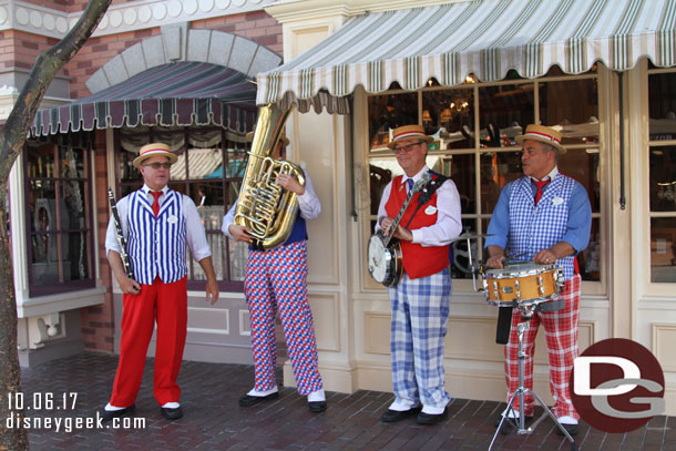 The Straw Hatters performing on Main Street USA