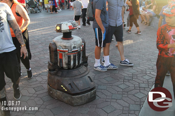 He is a prototype of a droid that you may find in Star Wars: Galaxy's Edge and Imagineers have been play testing him in the park as well as at the D23 Expo.