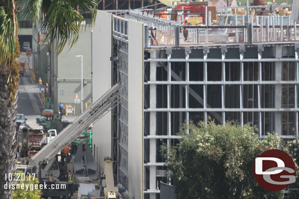 Exterior Walls are being added to this building too now.  Interesting the crane is extended into the building.  I could not see what was being lifted.