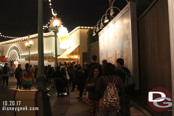 The line for ice cream filled its queue and stretched down to the second billboard.