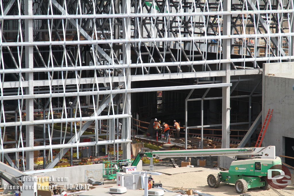 Inside a crew is working on preparations for the hanger floor.