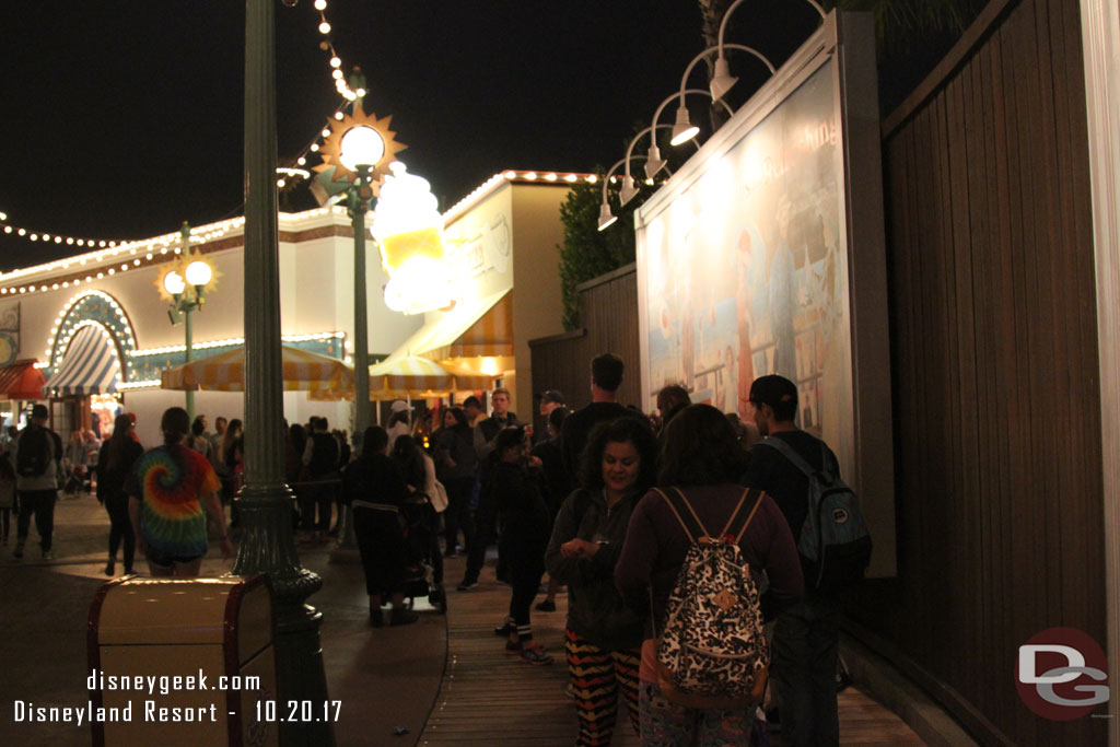 The line for ice cream filled its queue and stretched down to the second billboard.