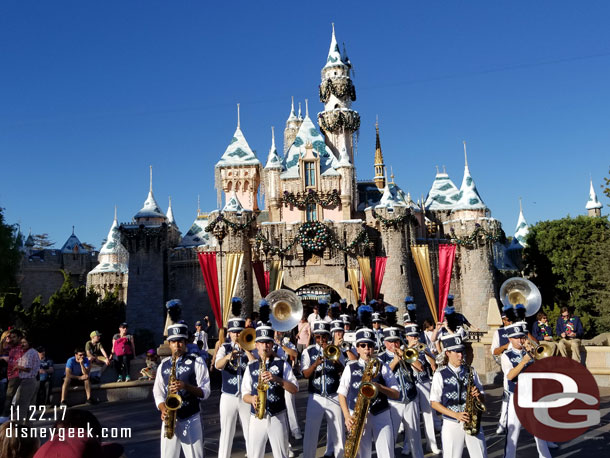 Disneyland Band performing in front of Sleeping Beauty Castle (The 95 degree weather, snow on the castle and band playing Star Wars felt like an odd mix)