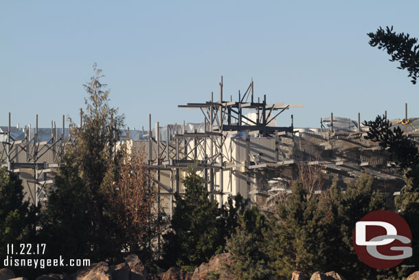 More wire mesh is being installed on the steel structure around the Battle Escape show building.