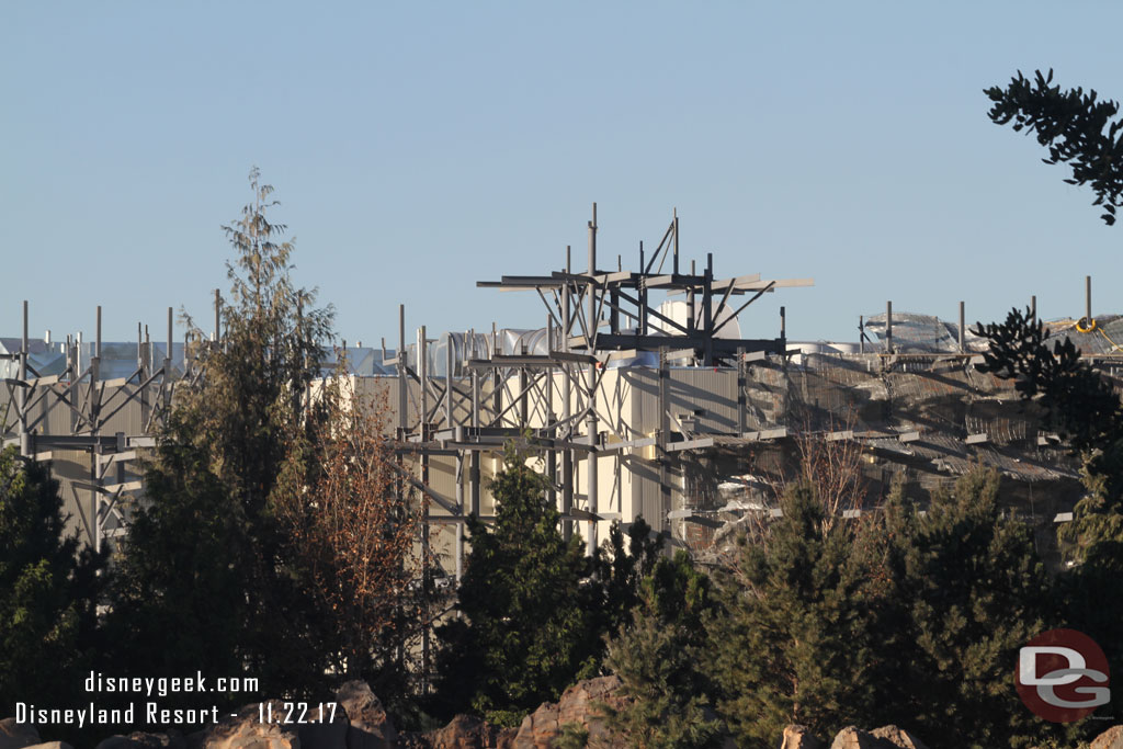 More wire mesh is being installed on the steel structure around the Battle Escape show building.