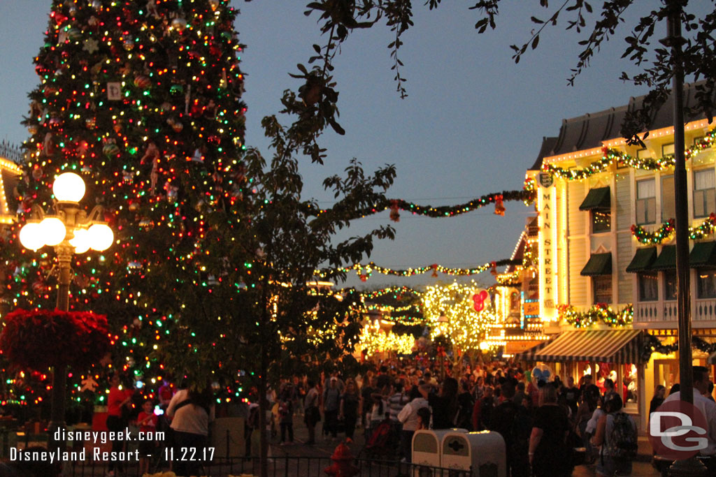 Main Street USA at Disneyland was alive with activity as always.  Healthy queues for pictures around the tree.