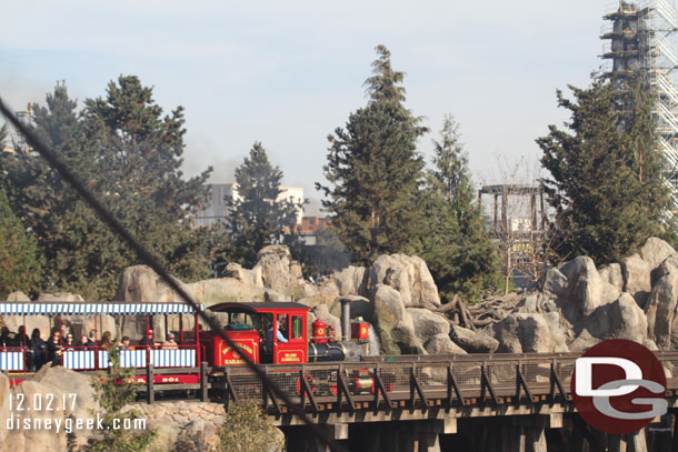 The Ward Kimball steaming along the Rivers of America. In the background notice the steel for a structure rising between the trees.