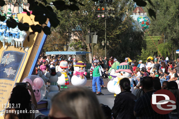 Passing by a Christmas Fantasy Parade after lunch.