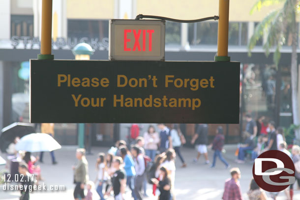 The signs at the Downtown Disney Monorail station need to be updated..  handstamps are no longer used at the Disneyland Resort.