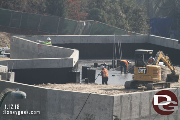 A closer look at the roof. You can see the part they are sealing today as well as some columns that will be where steel is attached for the facade.  Dirt will most likely be brought in all the way to the top of the black.