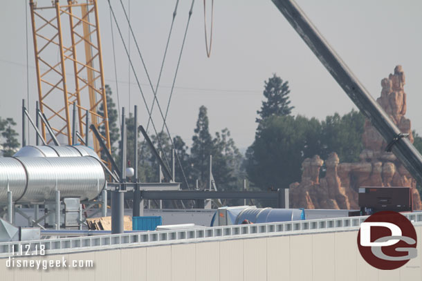 More steel is visible beyond the Battle Escape Building.