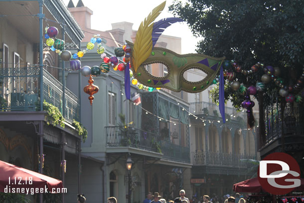 Christmas decorations have been removed from New Orleans Square.  The mask has remained, assuming for Mardi Gras