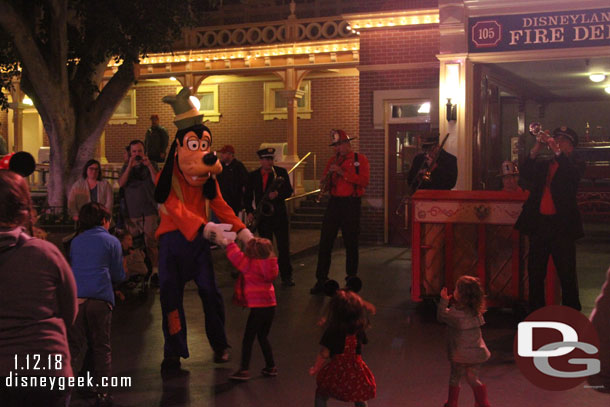 Goofy was dancing with kids as the Hook & Ladder Co played.