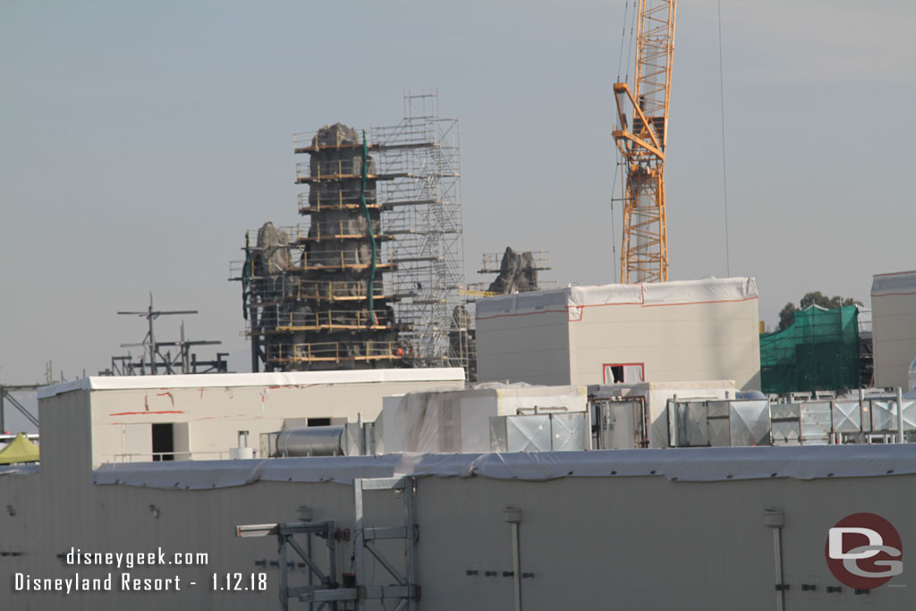 The peaks in the distance and to the left more support steel for rock work taking shape.