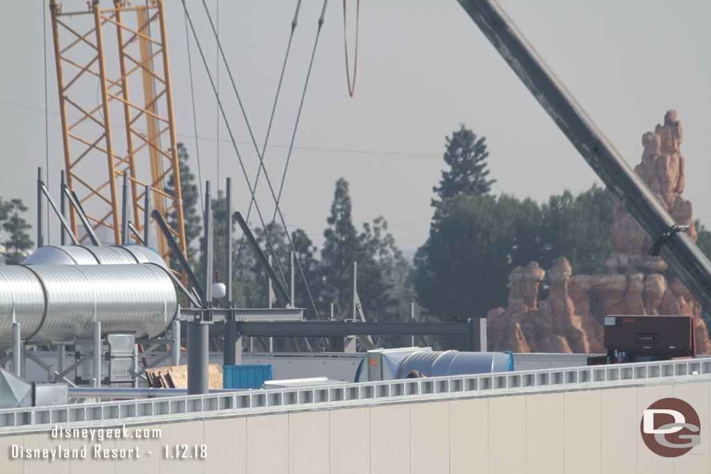 More steel is visible beyond the Battle Escape Building.